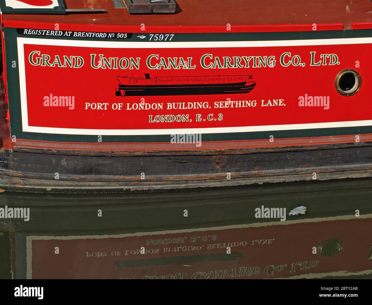 Pavo No 327,Red barge,Grand Union Canal Carrying Co Ltd,registered at Brentford no 503,75977,Port Of London Building,Seething Lane,EC3 Stock Photo