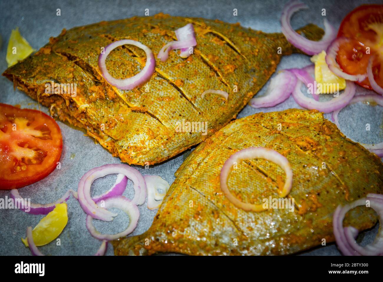 Black Pomfret with indian masala ready grill Stock Photo Alamy