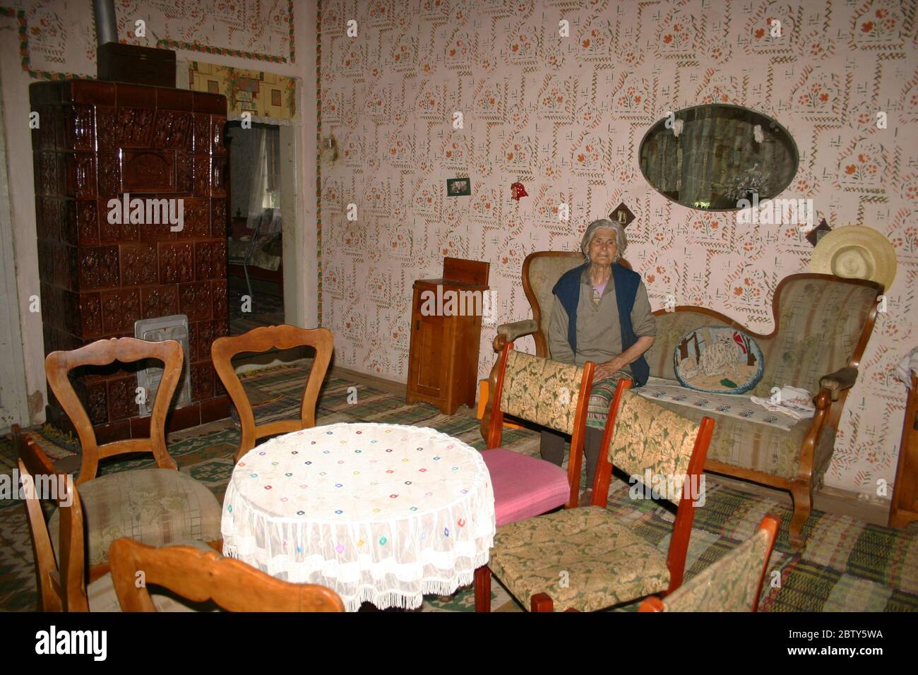 Room in old house full of stuff Stock Photo - Alamy