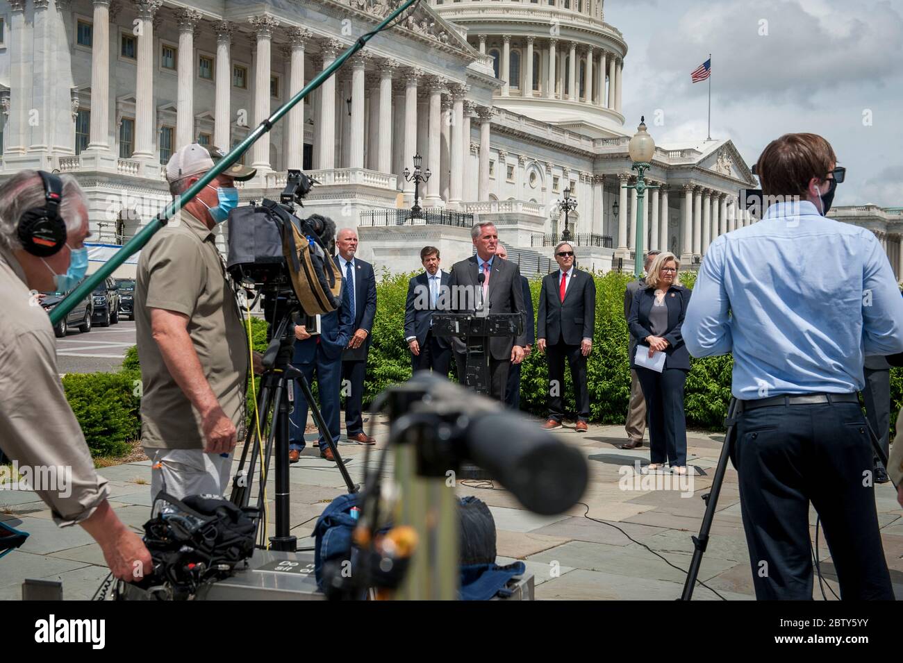 House Minority Leader Rep. Kevin McCarthy (R-Calif.) holds a media availability with House Minority Whip Rep. Steve Scalise (R-LA), House GOP Conference Chairwoman Liz Cheney (R-WY) and others, to announce that Republican leaders have filed a lawsuit against House Speaker Nancy Pelosi and congressional officials in an effort to block the House of Representatives from using a proxy voting system to allow for remote voting during the coronavirus pandemic, outside of the U.S. Capitol in Washington, DC., Wednesday, May 27, 2020. Credit: Rod Lamkey / CNP /MediaPunch Stock Photo
