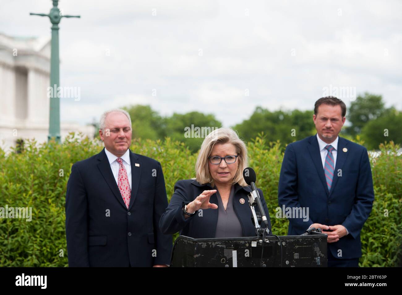 House GOP Conference Chairwoman Liz Cheney (R-WY) offers remarks as she is joined by House Minority Leader Rep. Kevin McCarthy (R-Calif., left), House Minority Whip Rep. Steve Scalise (R-LA) and others to announce that Republican leaders have filed a lawsuit against House Speaker Nancy Pelosi and congressional officials in an effort to block the House of Representatives from using a proxy voting system to allow for remote voting during the coronavirus pandemic, outside of the U.S. Capitol in Washington, DC., Wednesday, May 27, 2020. Credit: Rod Lamkey/CNP /MediaPunch Stock Photo