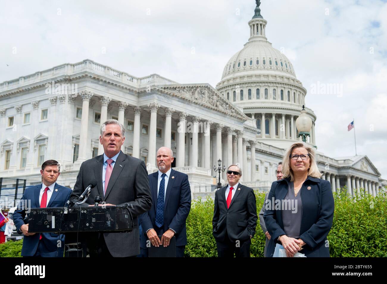 House Minority Leader Rep. Kevin McCarthy (R-Calif.) holds a media availability with House Minority Whip Rep. Steve Scalise (R-LA), House GOP Conference Chairwoman Liz Cheney (R-WY) and others, to announce that Republican leaders have filed a lawsuit against House Speaker Nancy Pelosi and congressional officials in an effort to block the House of Representatives from using a proxy voting system to allow for remote voting during the coronavirus pandemic, outside of the U.S. Capitol in Washington, DC., Wednesday, May 27, 2020. Credit: Rod Lamkey/CNP /MediaPunch Stock Photo