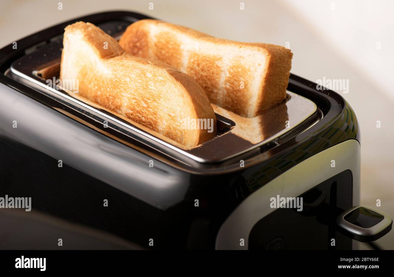 Toaster with hot toast for breakfast Stock Photo Alamy