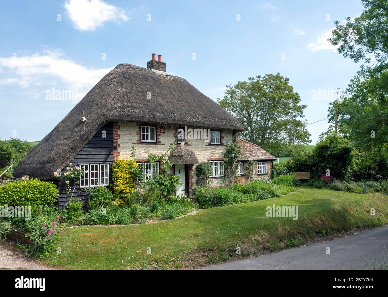 Picture postcard thatched cottage at South Lane, Chalton, Hampshire, England, UK Stock Photo