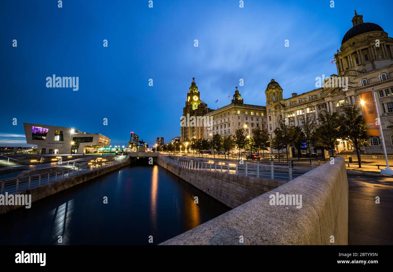 Pier Head and the Three Graces on the River Mersey Waterfront during blue hour, UNESCO World Heritage Site, Liverpool, Merseyside, England, United Kin Stock Photo