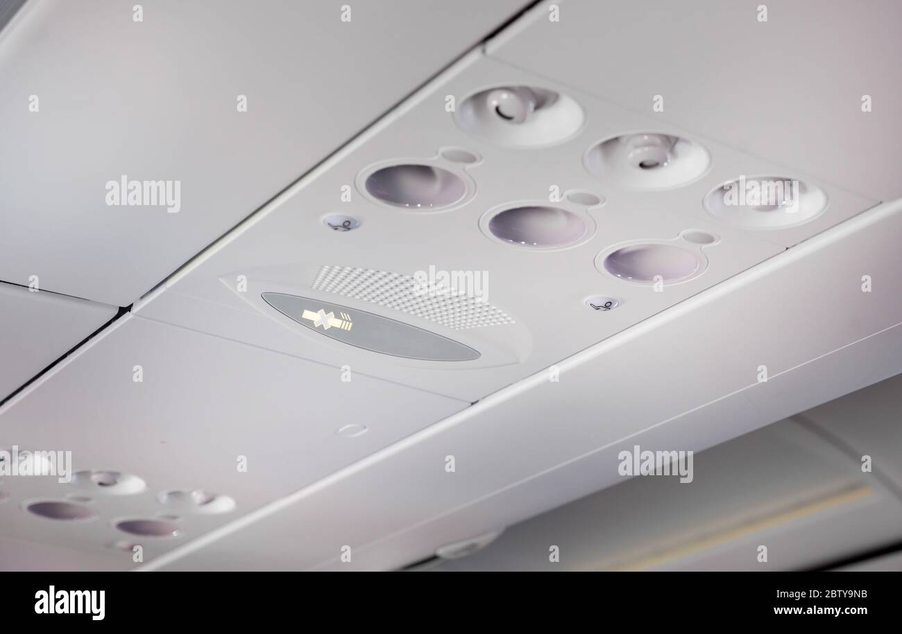 Lighting and air conditioning control panel in an aircraft cabin. Stock Photo