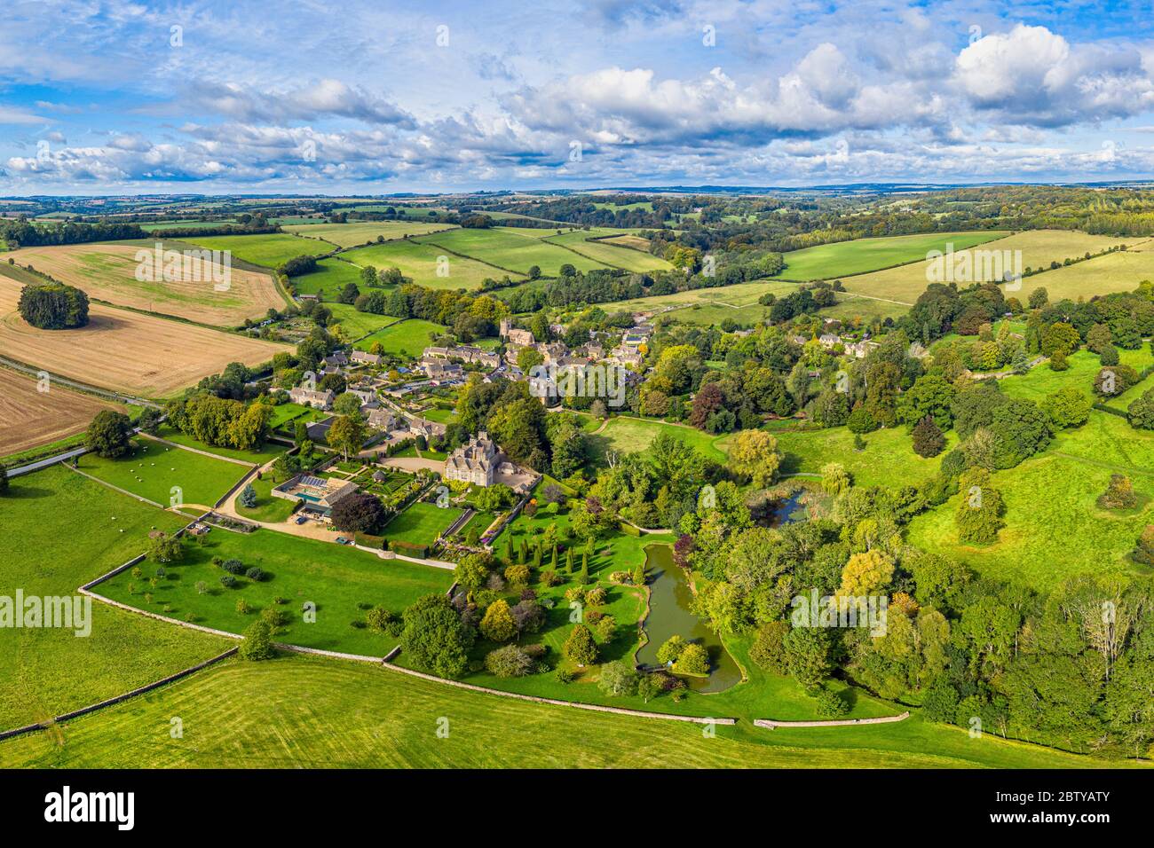 Aerial view over the village of Upper Slaughter in the Cotswolds, Gloucestershire, England, United Kingdom, Europe Stock Photo