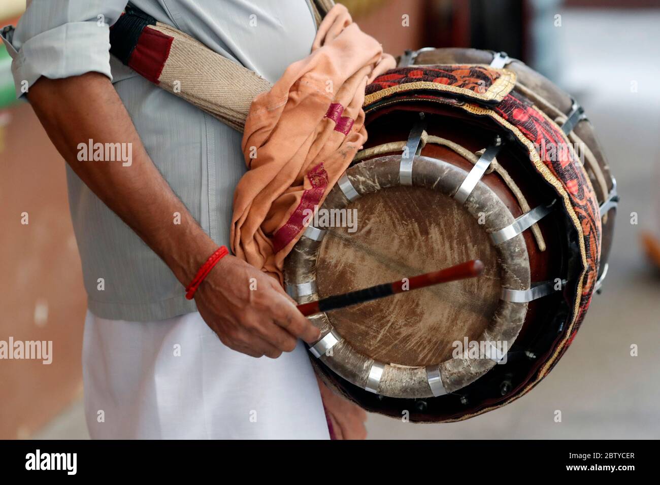 Musician playing a Thavil, a traditional Indian drum, Sri Mahamariamman