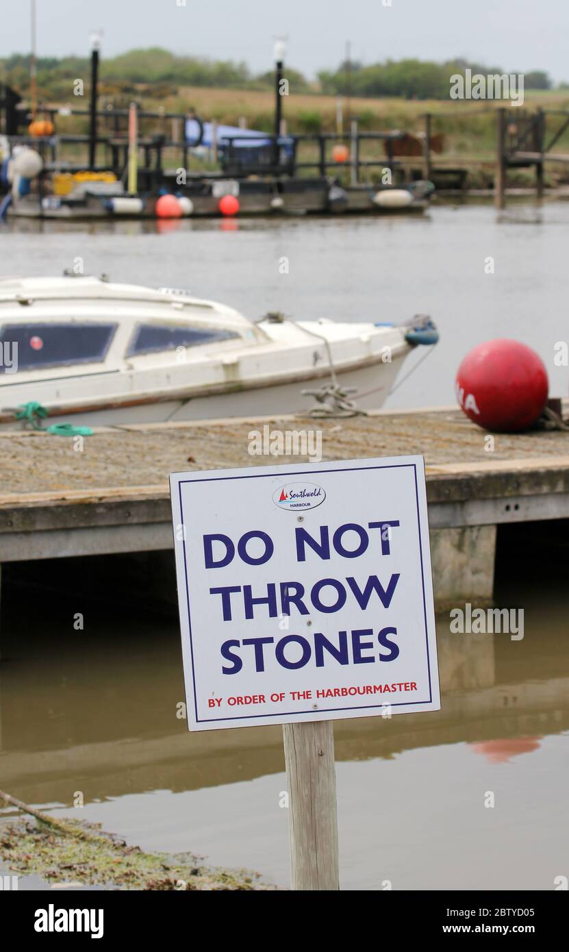 do not throw stones Southwold Harbour Stock Photo