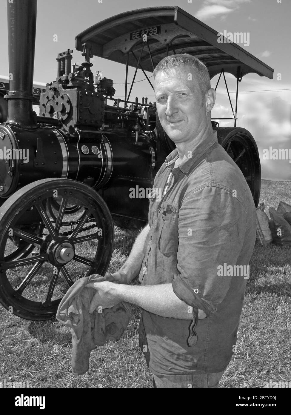 Steam Roller Driver, Engineer, with BE8739,Cheshire Steam Fair,Daresbury,Warrington,Cheshire,England,UK, WA4 Stock Photo