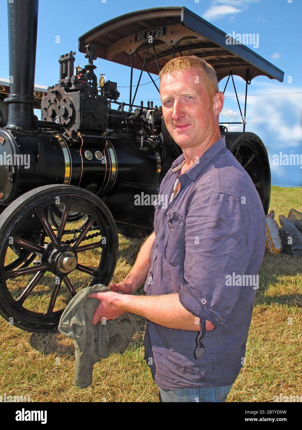 Steam Roller Driver, Engineer, with BE8739,Cheshire Steam Fair,Daresbury,Warrington,Cheshire,England,UK Stock Photo
