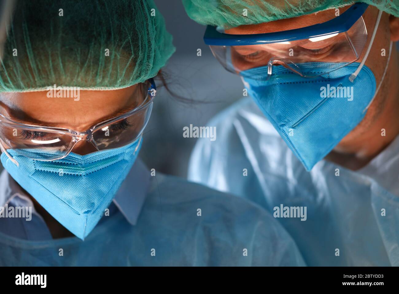 Concentrated medical workers in work Stock Photo