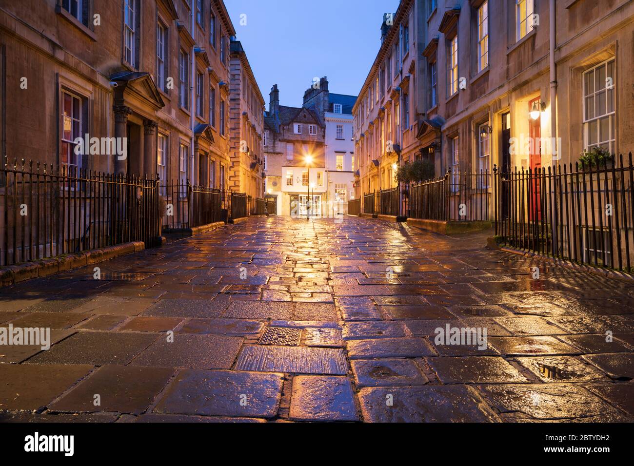 Wet paving stones and Georgian houses along the North Parade buildings, Bath, UNESCO World Heritage Site, Somerset, England, United Kingdom, Europe Stock Photo
