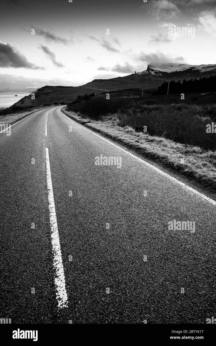 Road with markings by the sea on the Isle of Skye, Scotland Stock Photo