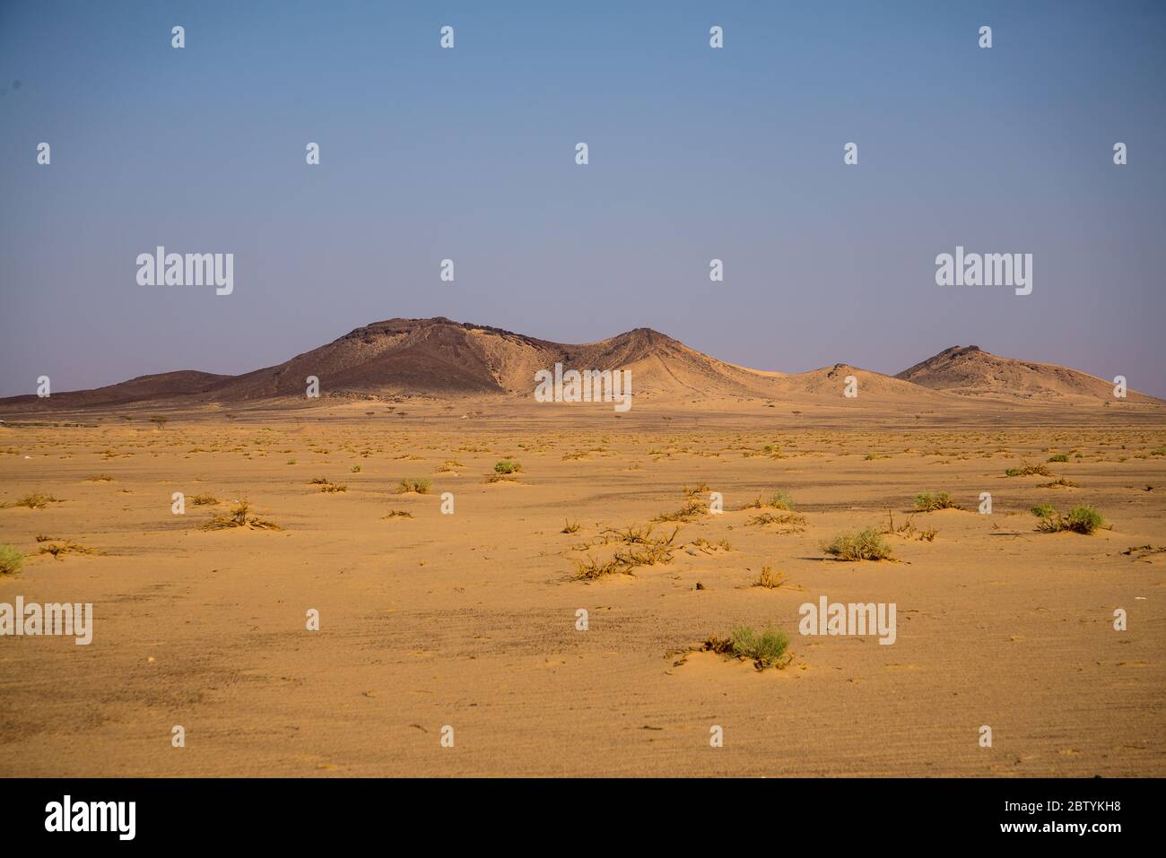 Mountain in the desert and the blue sky Stock Photo - Alamy
