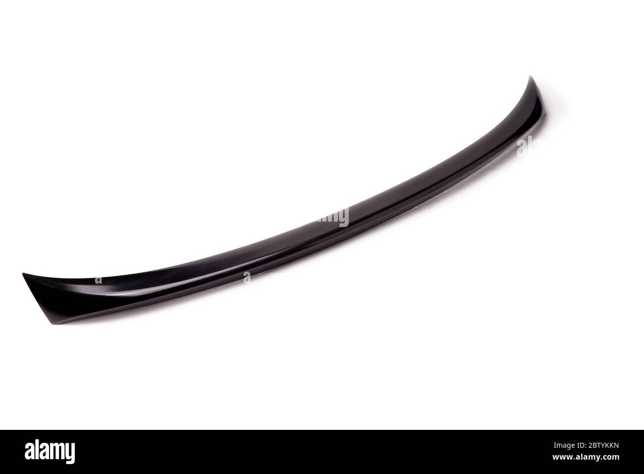 Black spoiler for installation on the trunk lid for tuning on a white