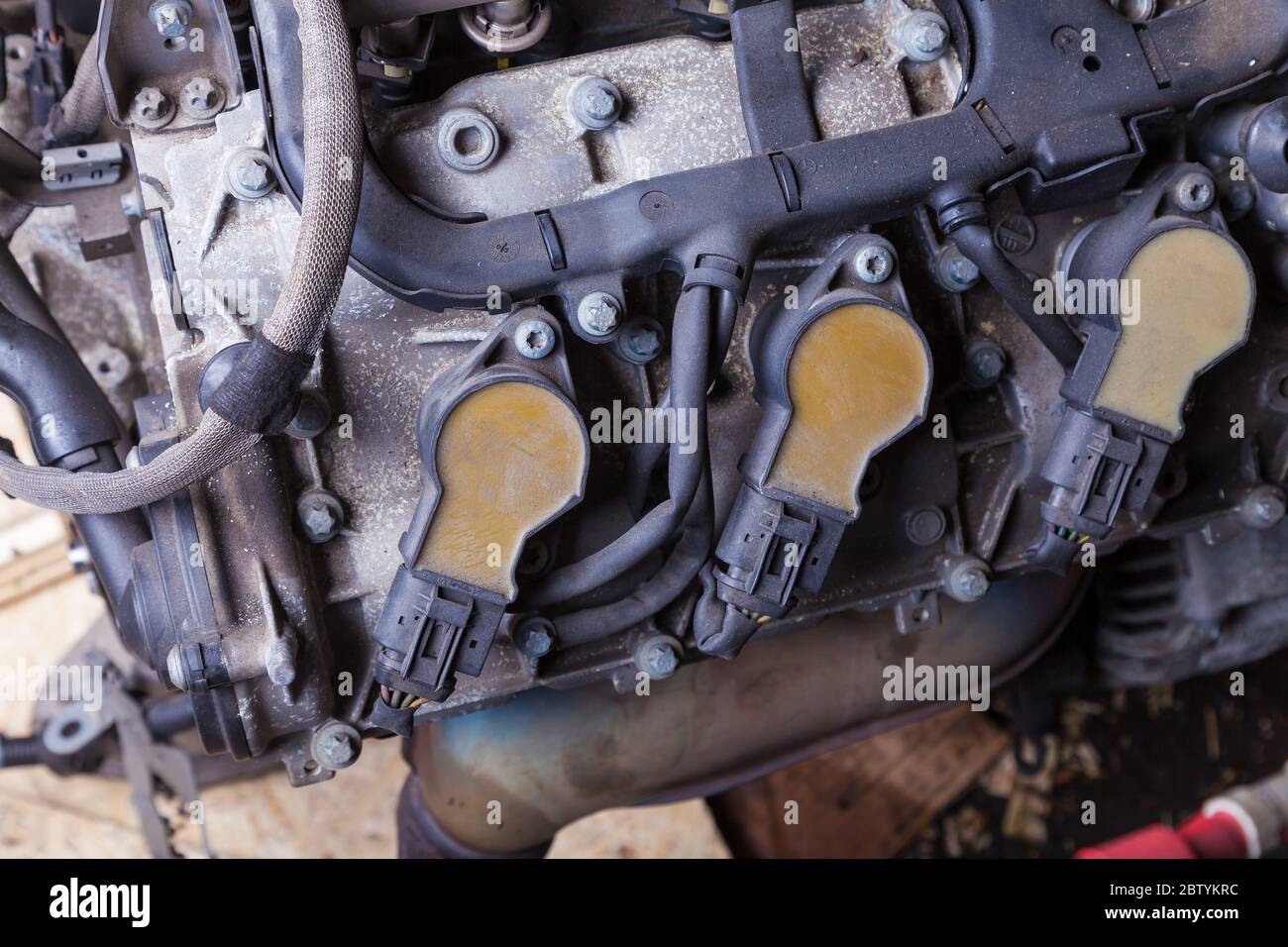 The engine’s ignition coil is an electric transformer that converts the