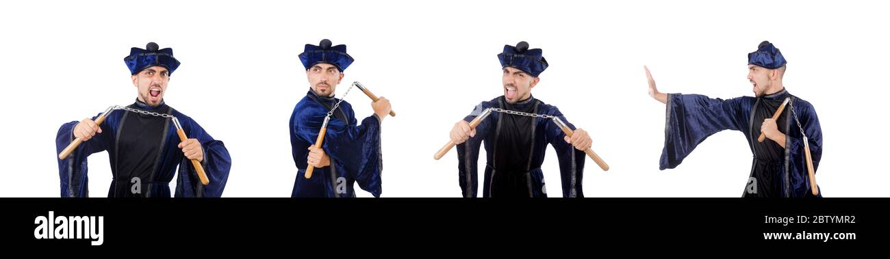 The martial arts master with nunchucks on white Stock Photo