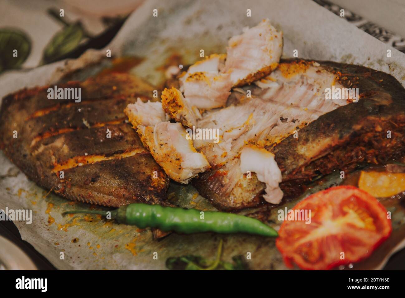 Black Pomfret grilled Stock Photo Alamy