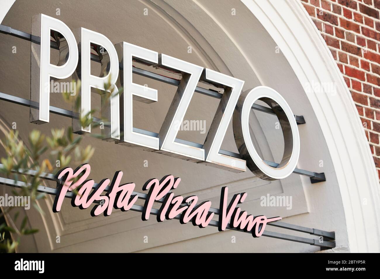 Sign for Prezzo restaurant on the High Street in Beaconsfield, Buckinghamshire, England, UK Stock Photo
