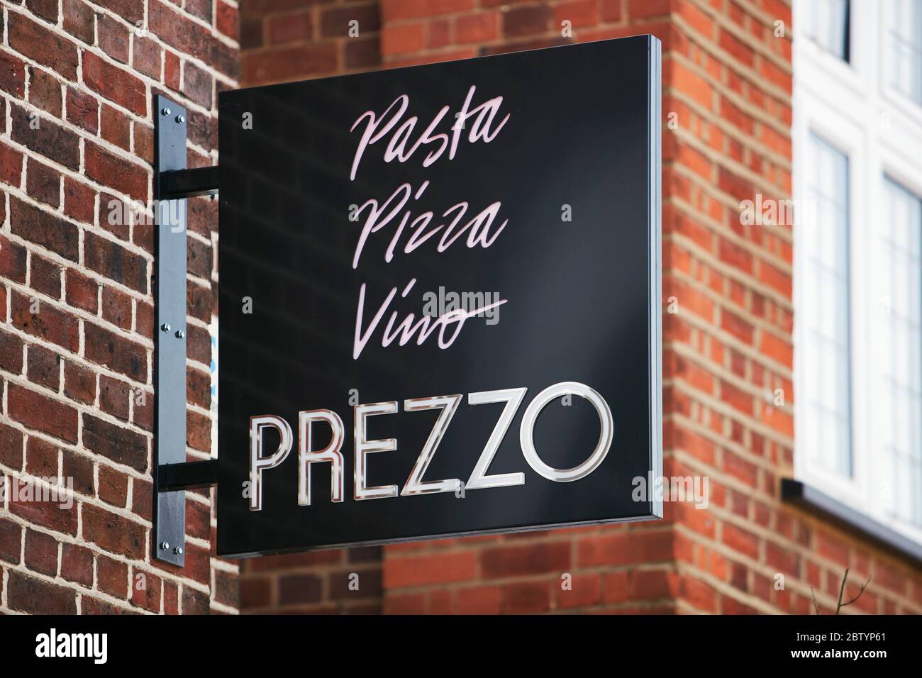 Sign for Prezzo restaurant on the High Street in Beaconsfield, Buckinghamshire, England, UK Stock Photo