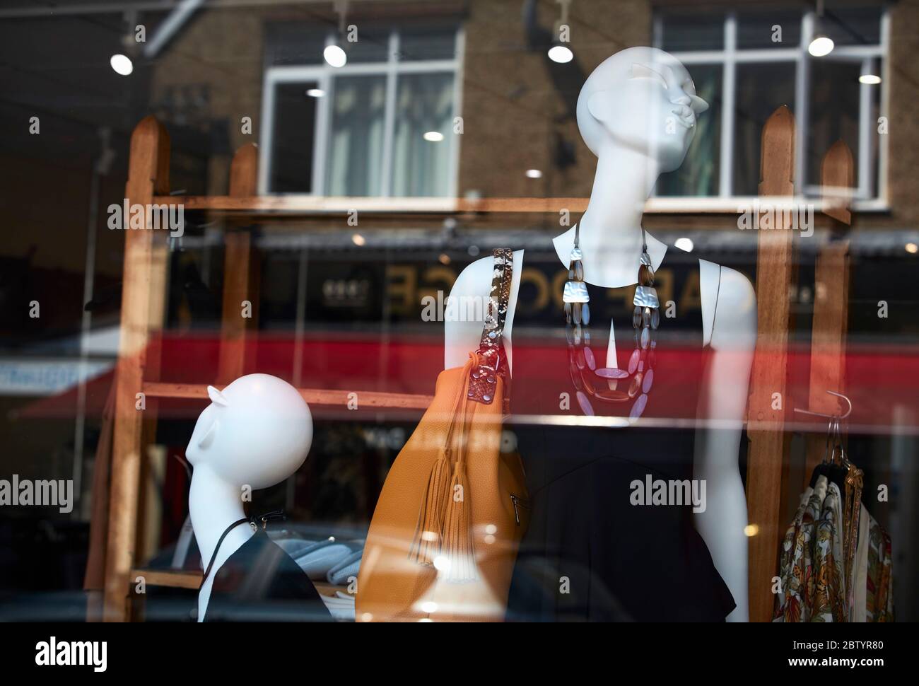 Window display for ladies fashion store in Gerrards Cross