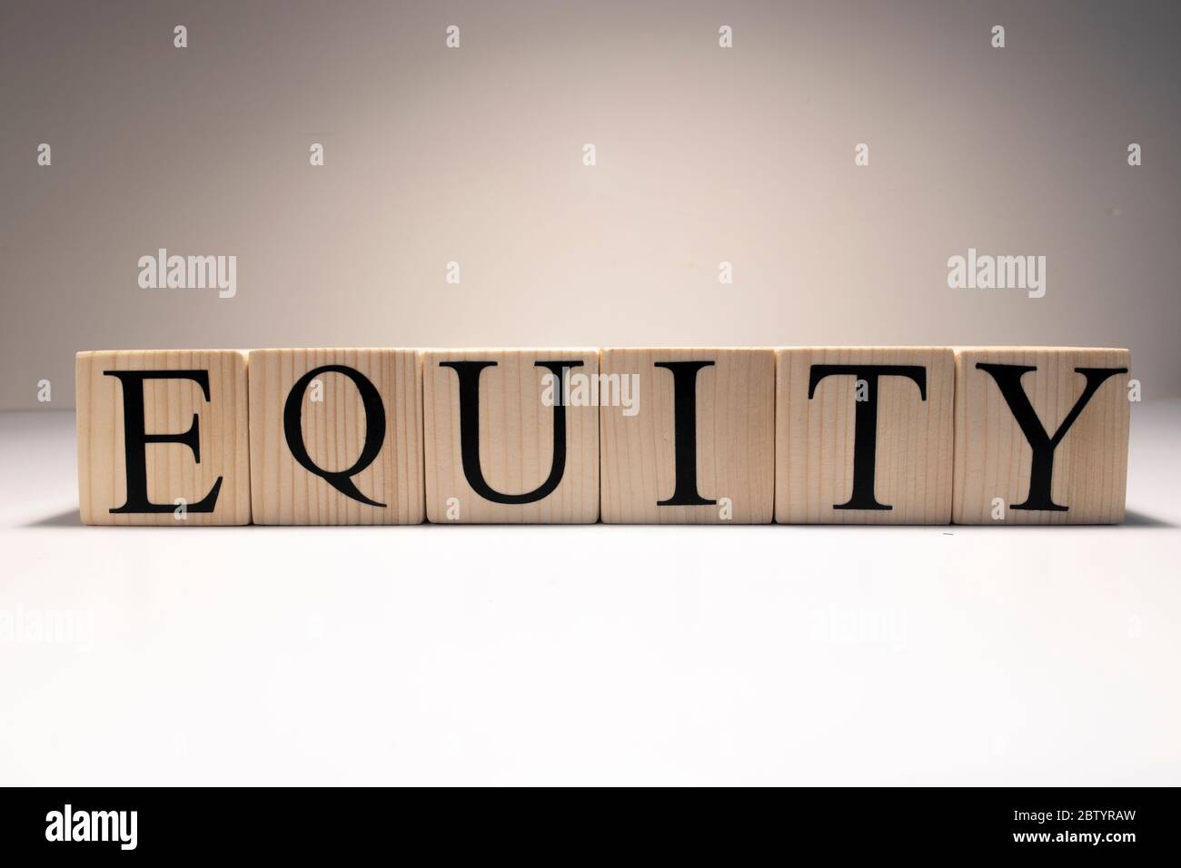 Equity Word Written In Wooden Cube. Close up. Stock Photo
