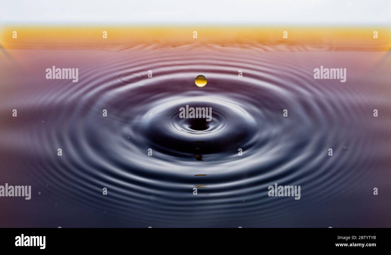 rippling after a few drops of coffee Stock Photo - Alamy