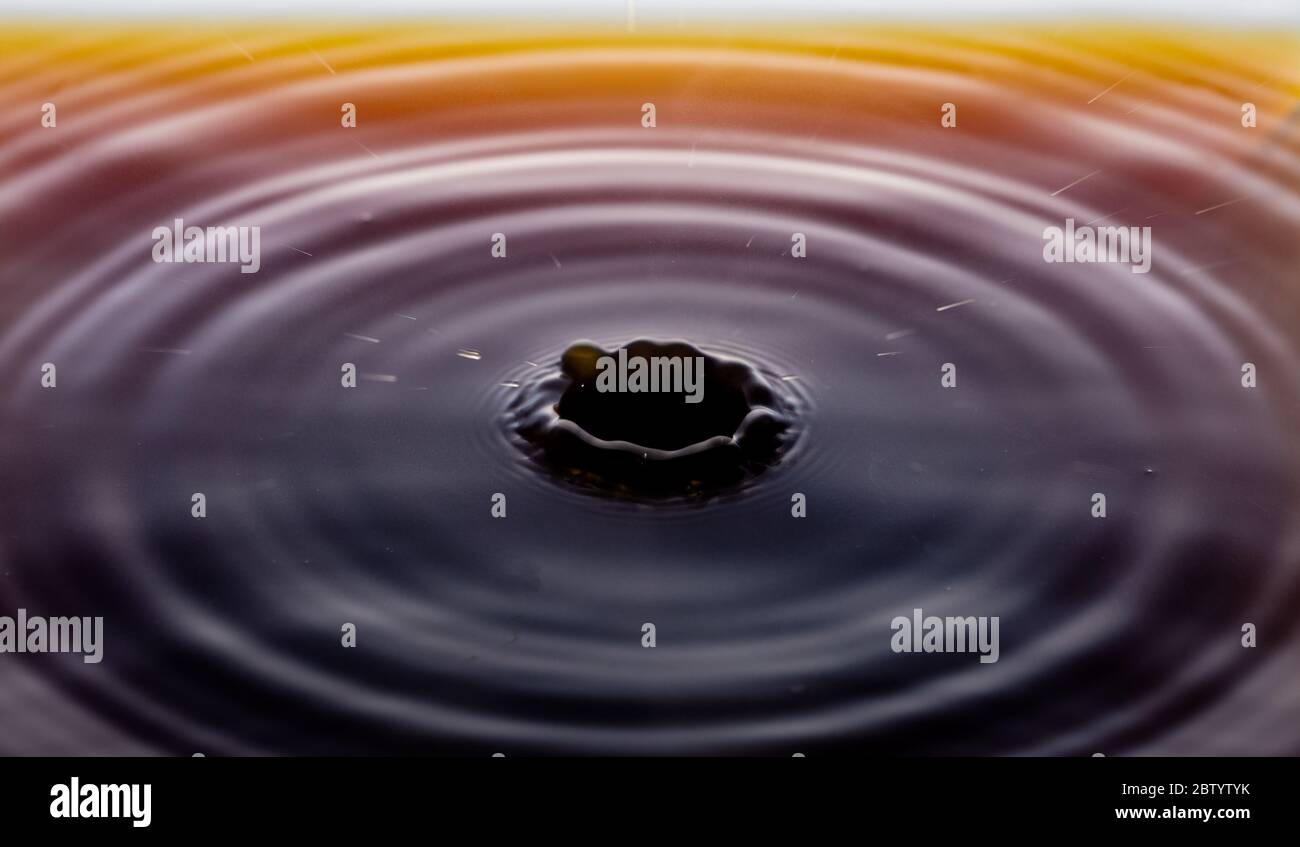 rippling after a few drops of coffee Stock Photo - Alamy