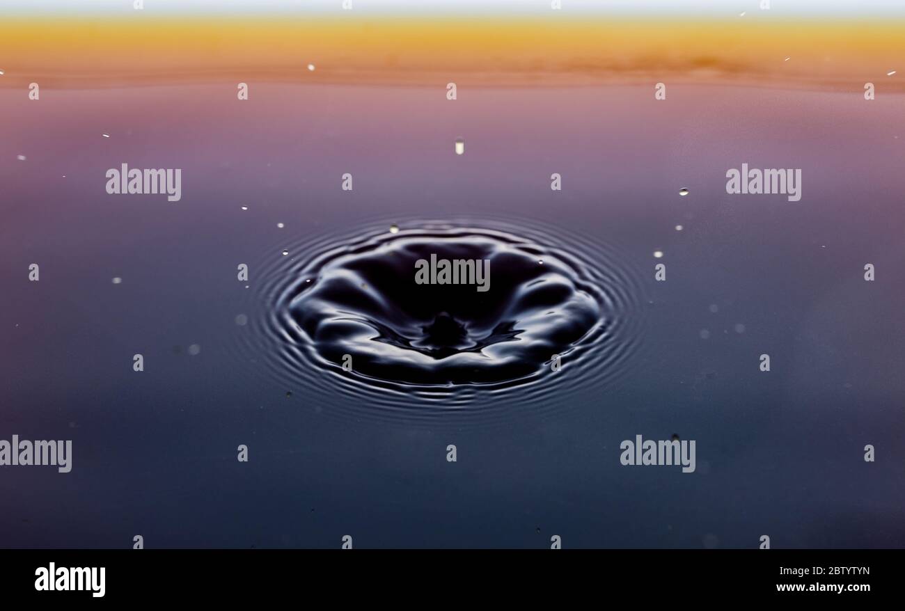 rippling after a few drops of coffee Stock Photo - Alamy