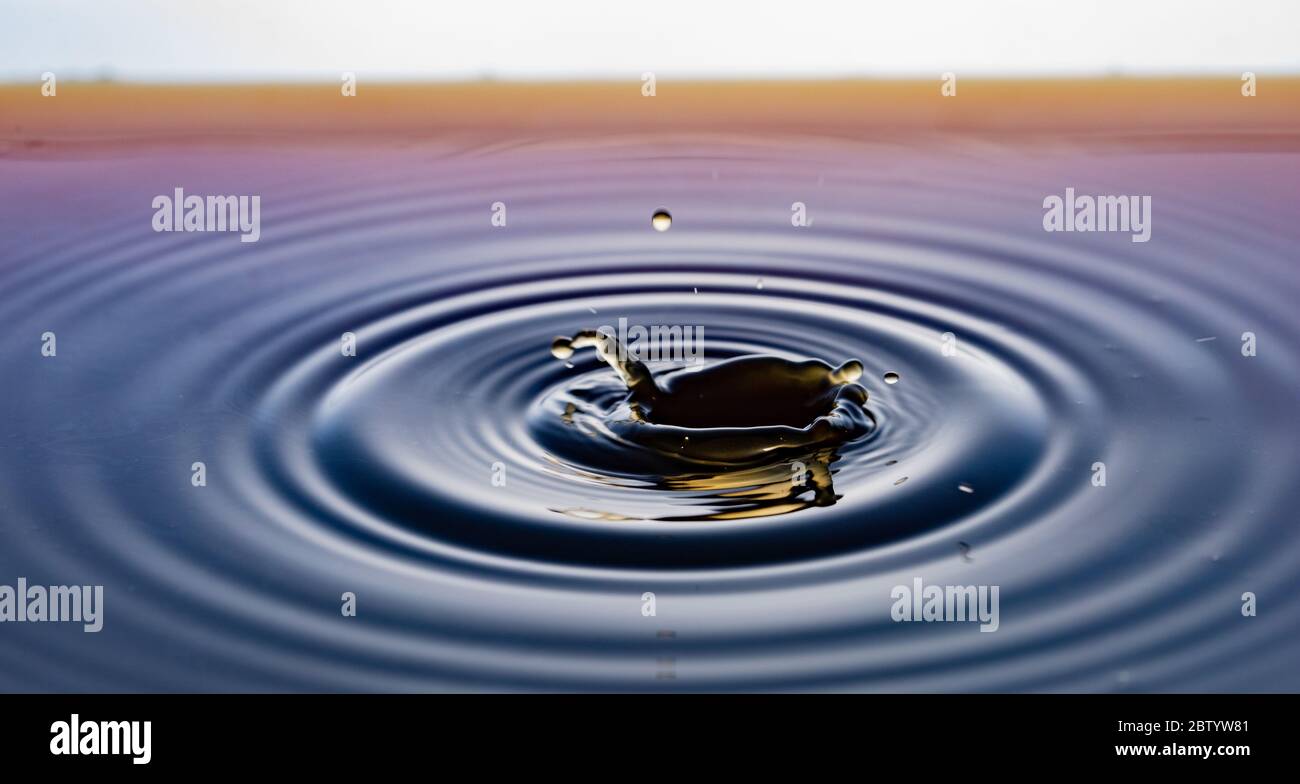 rippling after a few drops of coffee Stock Photo - Alamy