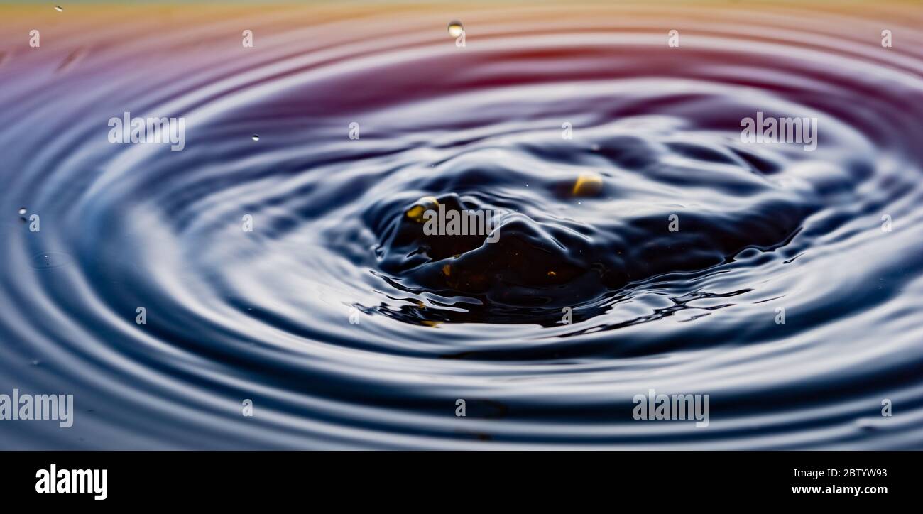 rippling after a few drops of coffee Stock Photo - Alamy
