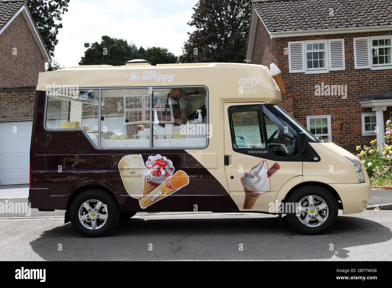 Walls Mr Whippy Ice Cream Van on an urban street in sunshine, Summer