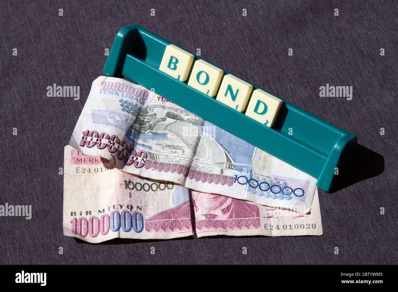 Turkish Lira Bond spelled in scrabble letters, 1 million lira note, 1