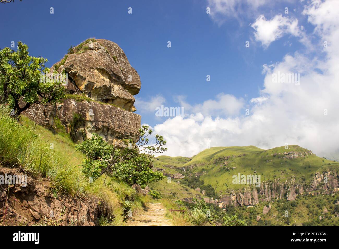 A weathered sandstone formation known as the Sphinx’s, in the Monks Cowl region of the Drakensberg, South Africa Stock Photo