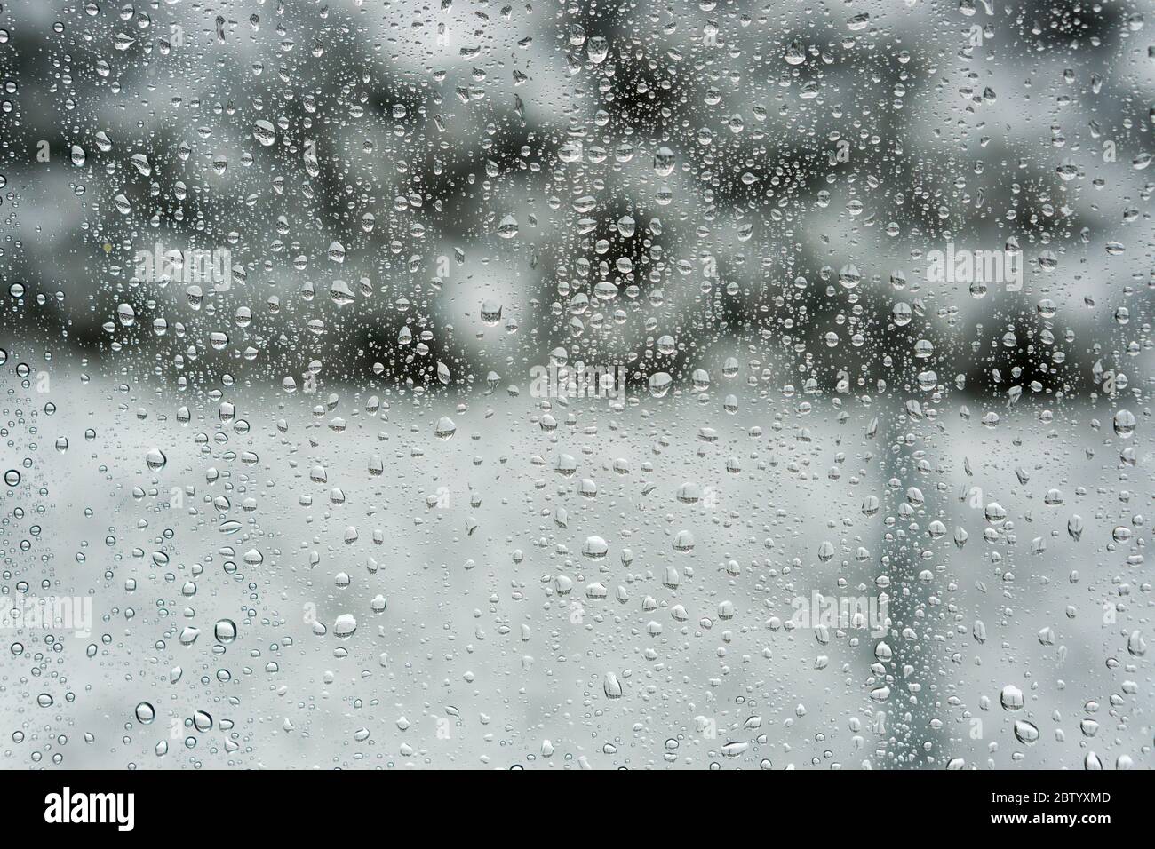 Water drops on a window pane in winter in Lower Bavaria Germany Stock Photo