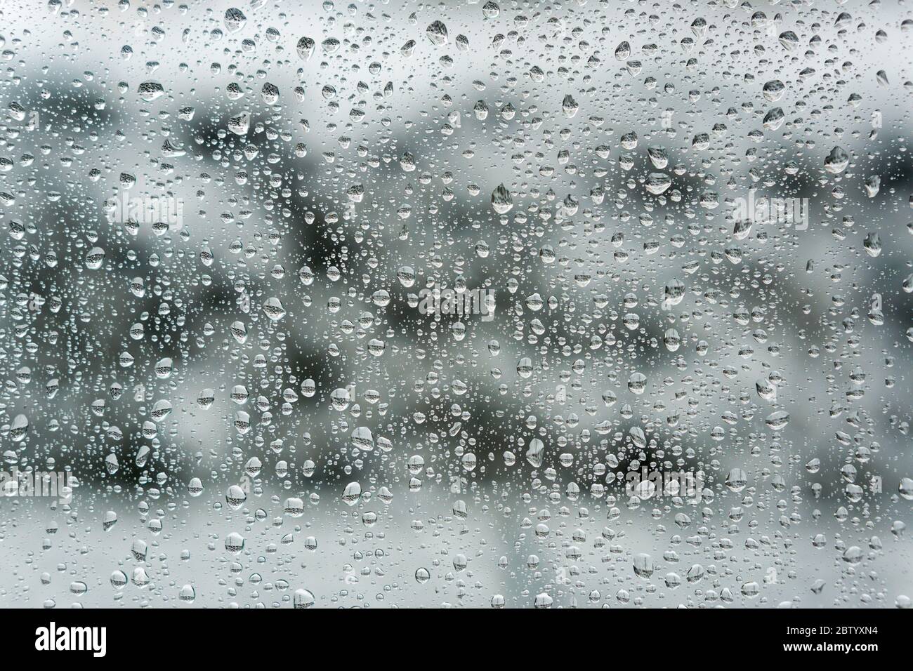 Water drops on a window pane in winter in Lower Bavaria Germany Stock Photo