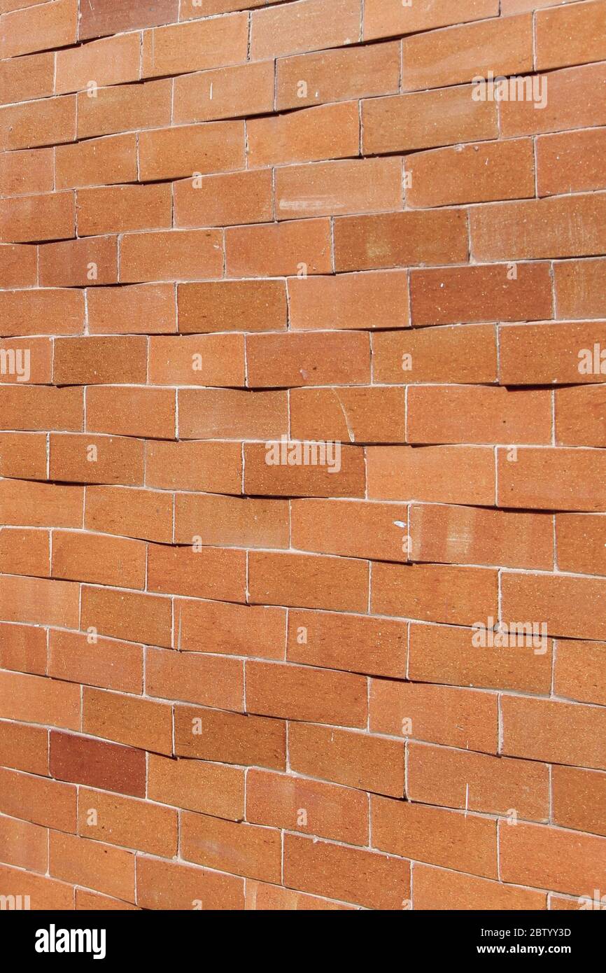 Closeup photograph of a brick wall, perspective Stock Photo