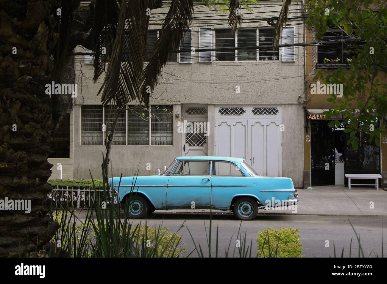 Photograph of a blue vintage car in Condesa District, Mexico City Stock Photo