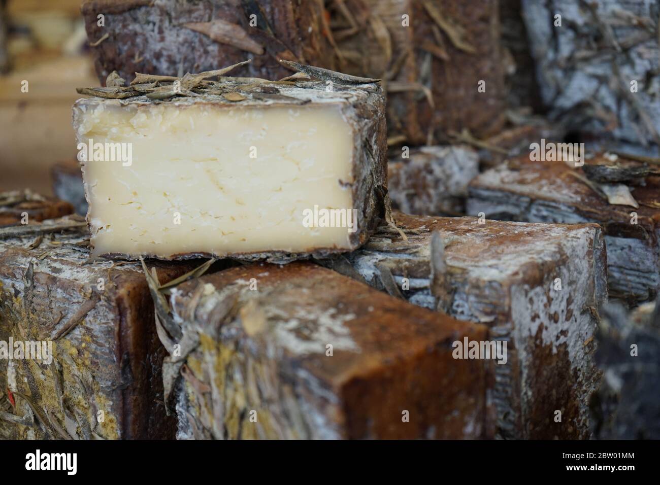 Forms of artisan cheese Stock Photo