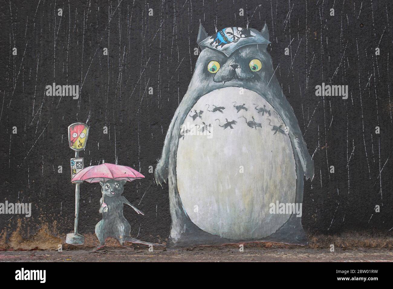 Graffiti Paste Ups Art by Lost Hills of Miyazaki’s animation movie “My Neighbor Totoro”. Stock Photo
