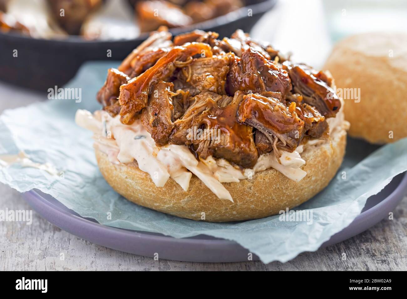 Pulled pork bun with coleslaw salad Stock Photo Alamy