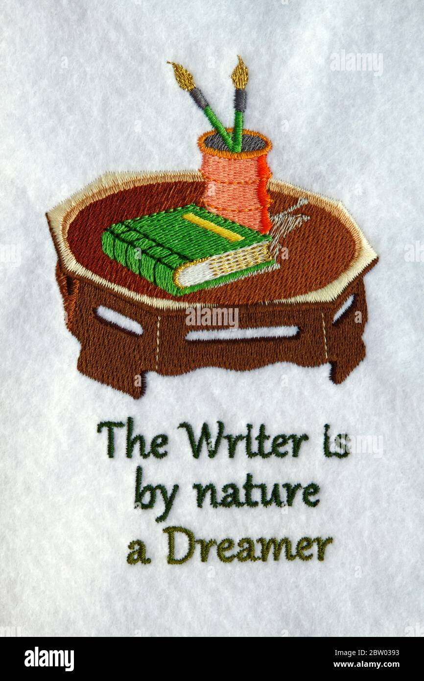 embroidered picture, words, text, The Writer Is By Nature A Dreamer, stitchery, handcraft, sailing ship, fabric, PR Stock Photo
