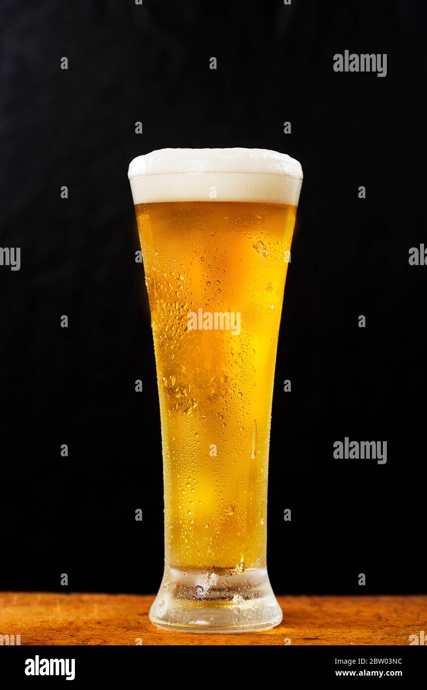Pint of lager half full hires stock photography and images Alamy