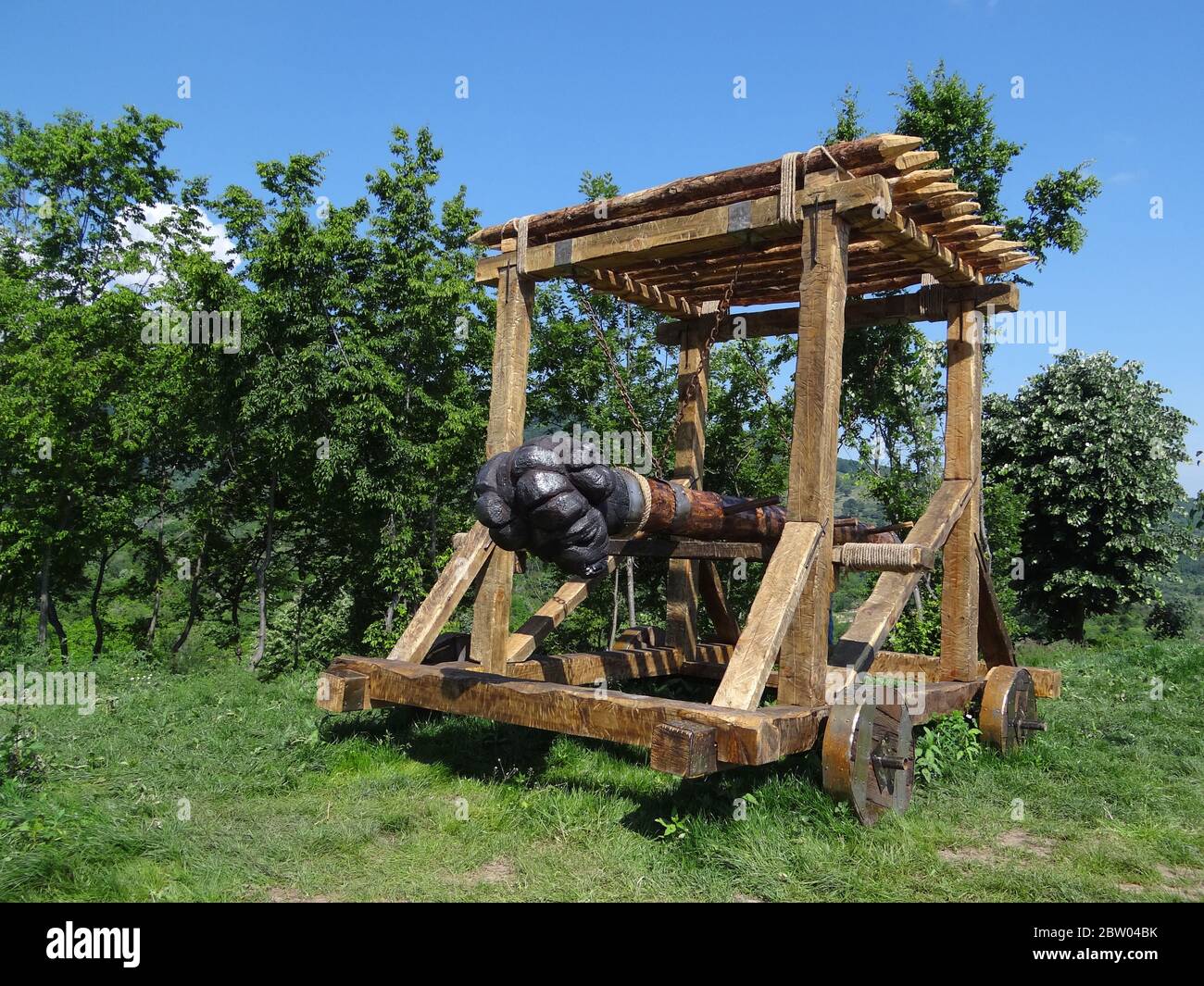 Medieval battering ram in park. Ancient weapon Stock Photo