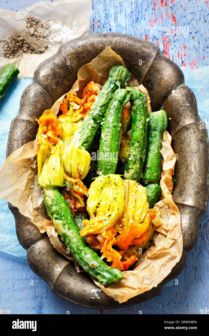 Traditional fried stuffed zucchini flowers hires stock photography and