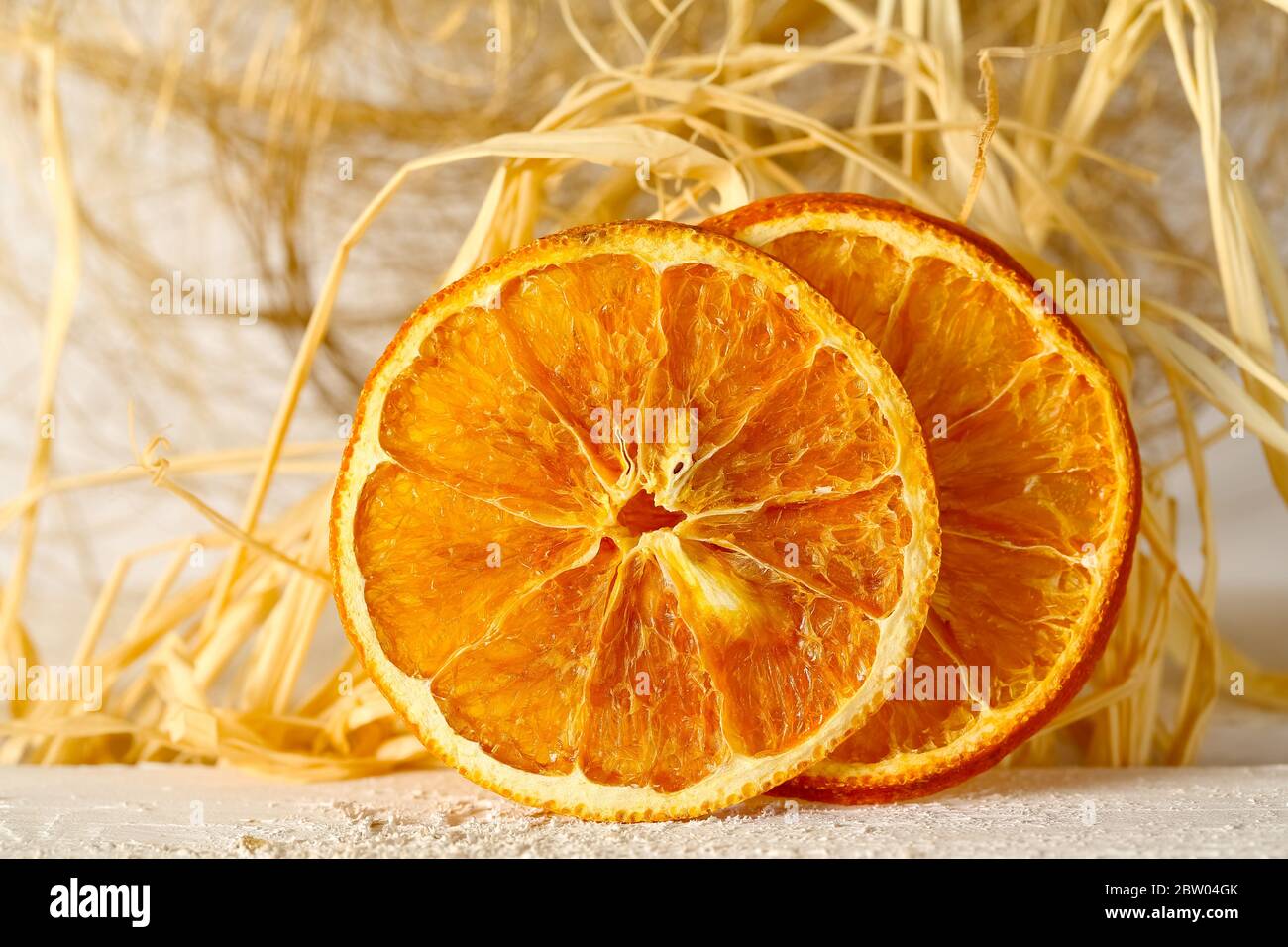 Two slices of dried orange fruit Stock Photo