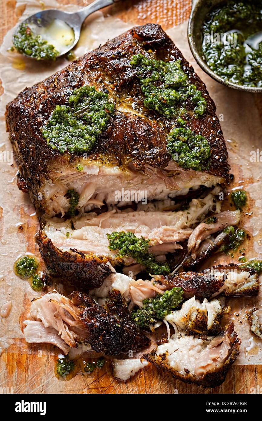 Italian pork belly roasted with herb dressing Stock Photo Alamy