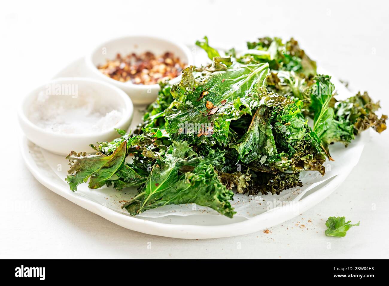Kale chips oil hires stock photography and images Alamy