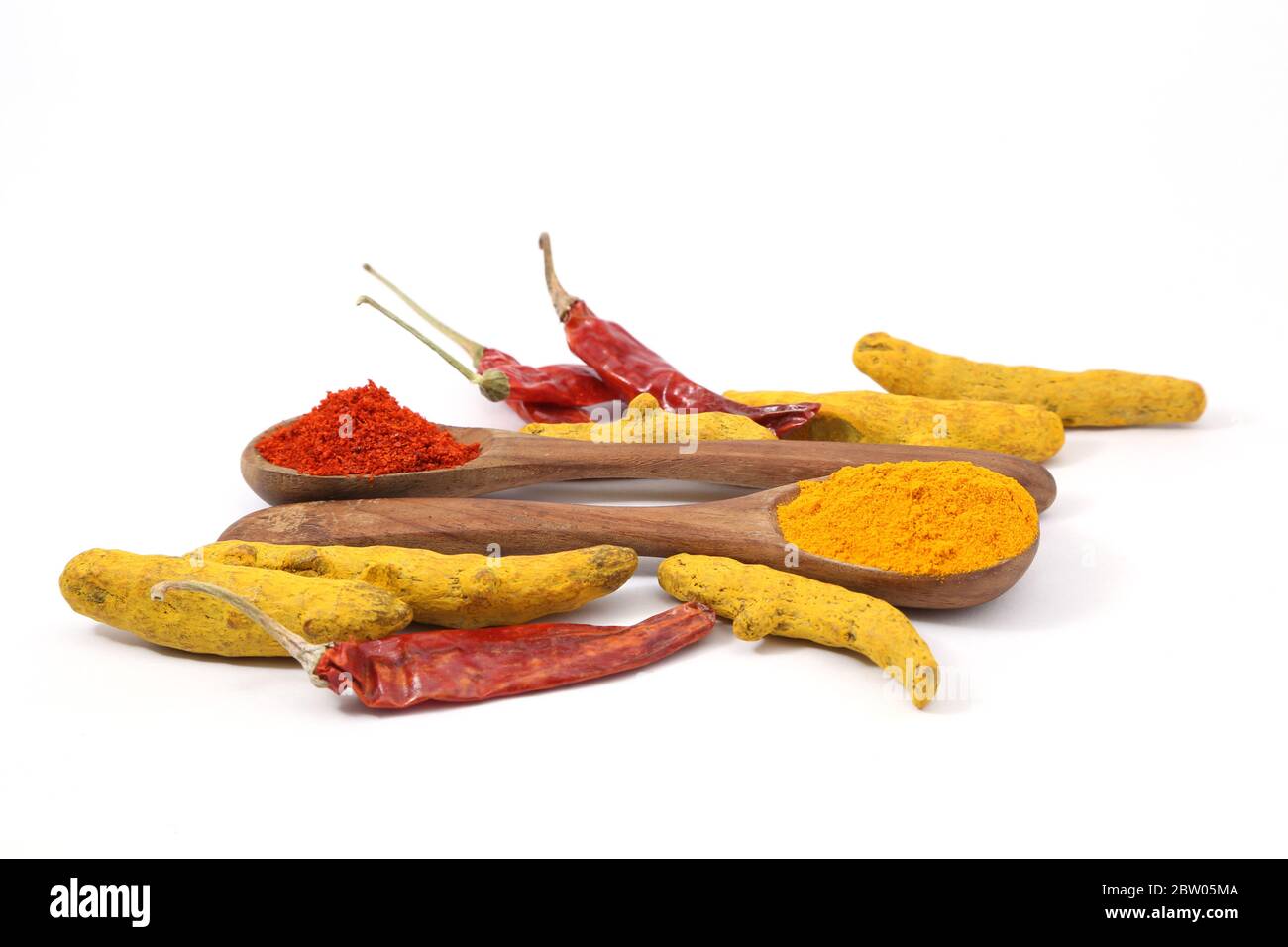 Turmeric and chili powder or spices on white background. Stock Photo